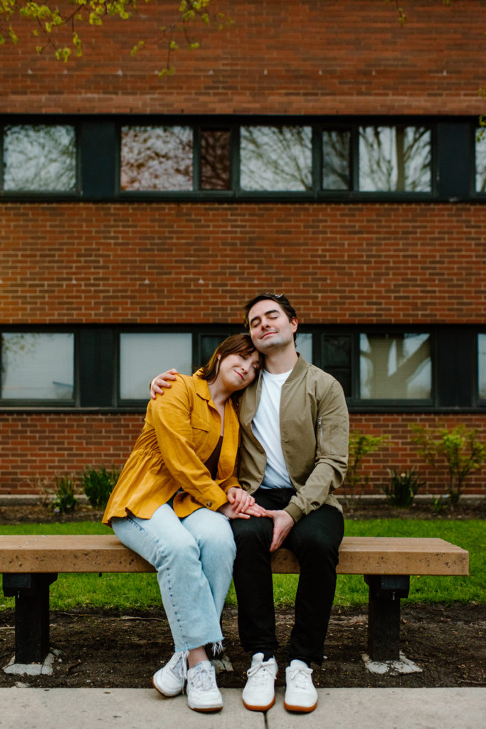a man and woman embrace outside of the university dorm they met at in chicago, illinois