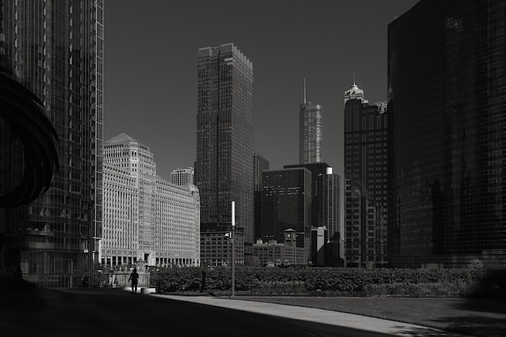 Chicago skyscrapers including Mercantile Mart overlooking the Chicago river. 